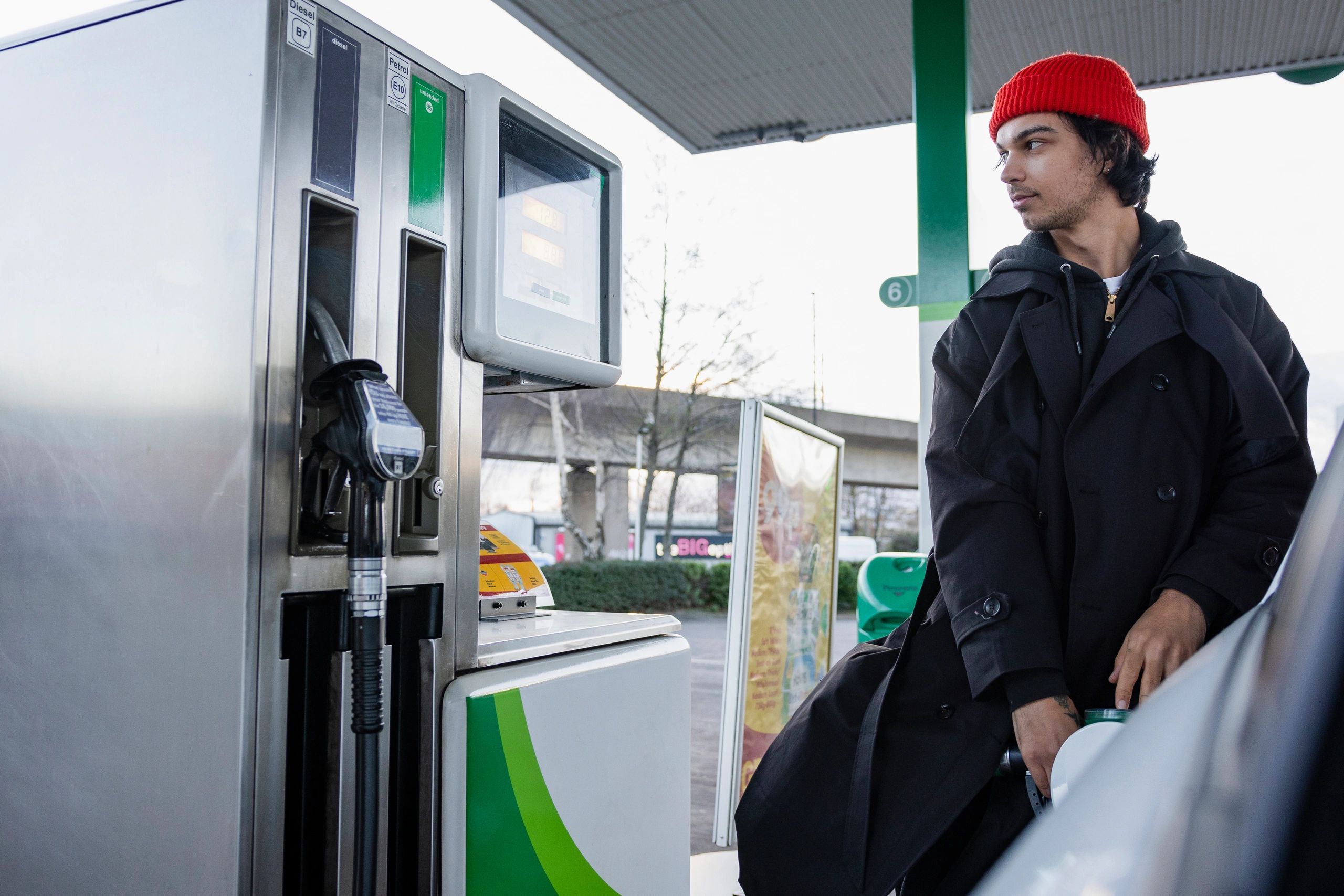 Filling his Car with Fuel